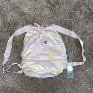 Ivivva by Lululemon mini backpack. Pink/white/yellow design. Good condition.